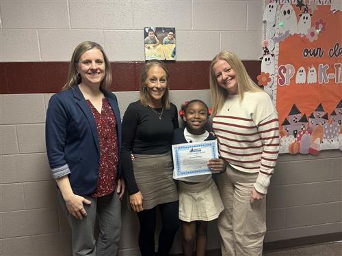 Jermany Phillips, McKinley's Stairclimber for October, poses with his award plaque.